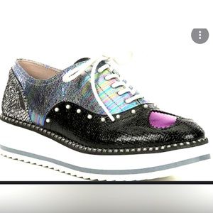 Betsey Johnson Marti
NEW Multi-Print Studde...
BETSEY JOHNSON.
Size 8 1/2.